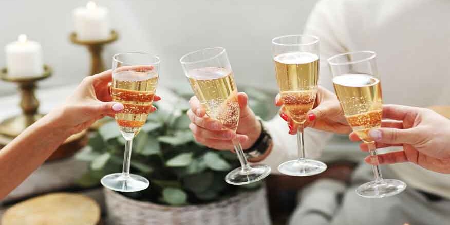 People toasting with glasses of prosecco